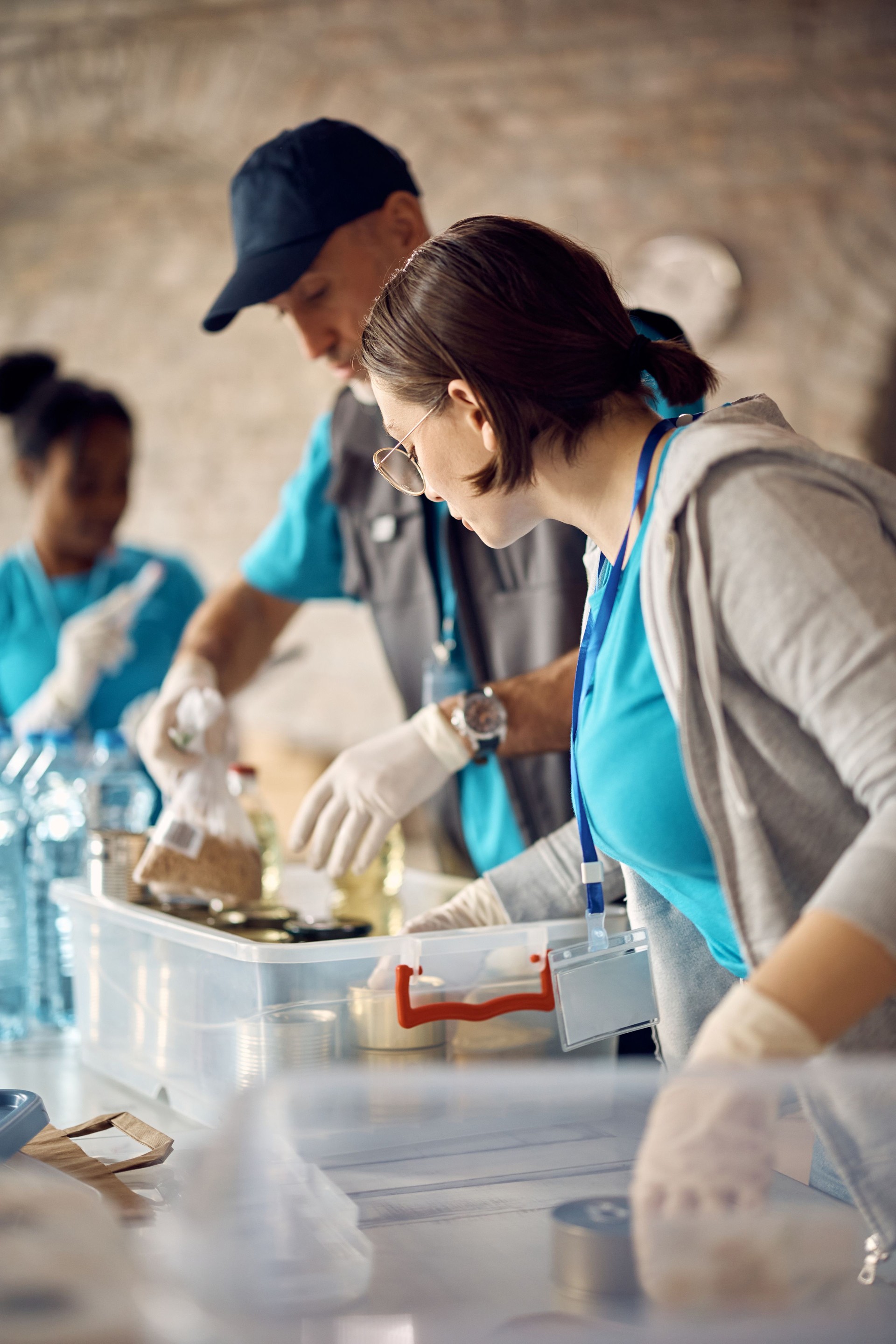 NGO volunteers sorting donation boxes