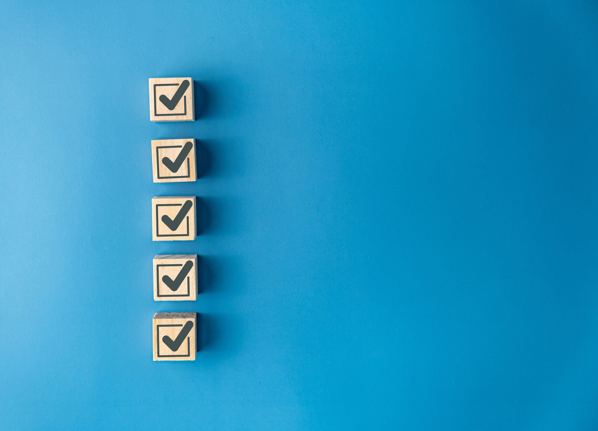 Regulatory compliance checklist with five completed checkmarks for medical communications